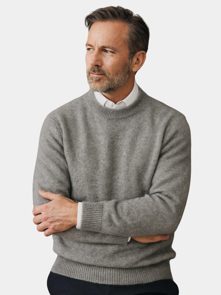 Gray brushed knit crew neck sweater worn with a white shirt, front view