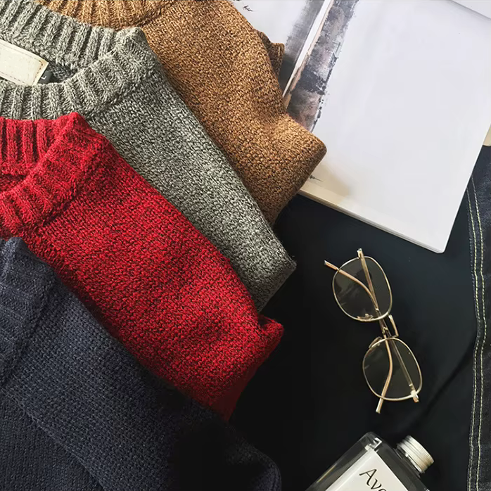 Elbow-patch crew neck sweaters folded