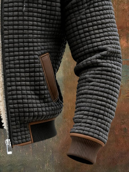 Elbow patch and ribbed cuff of the waffle knit jacket