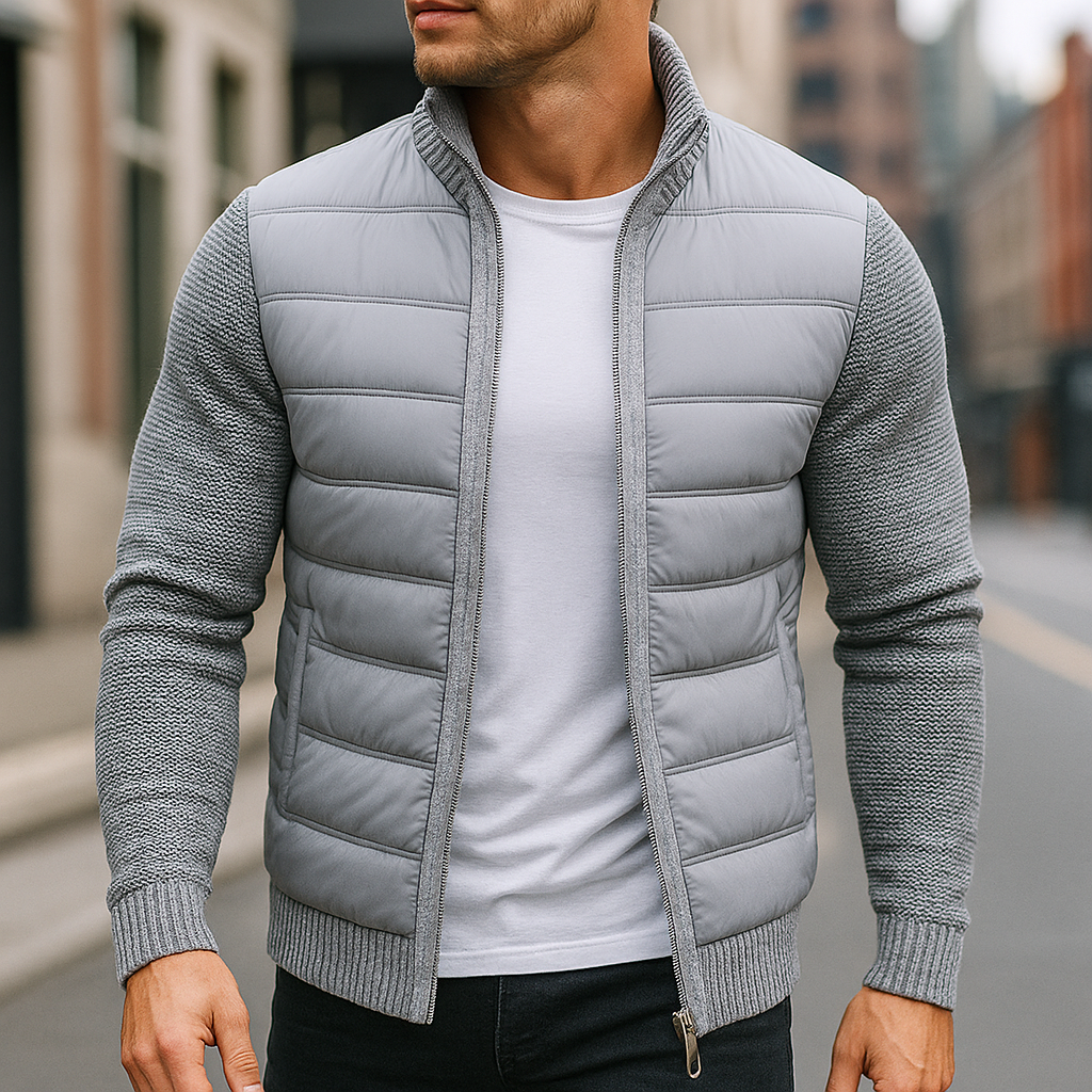 Light gray quilted jacket with knit sleeves and ribbed stand collar, worn open