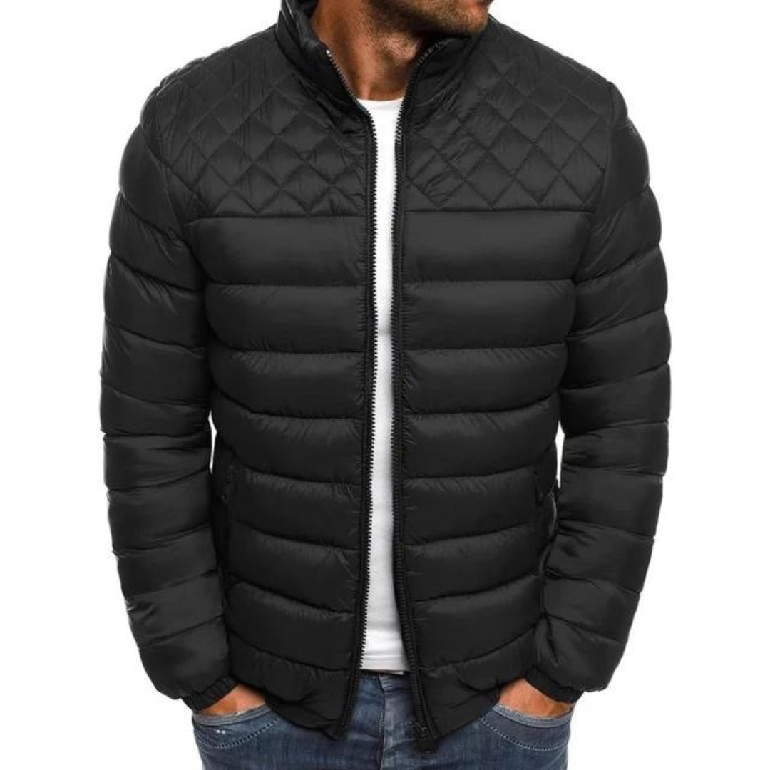 Man wearing a black quilted-yoke puffer jacket