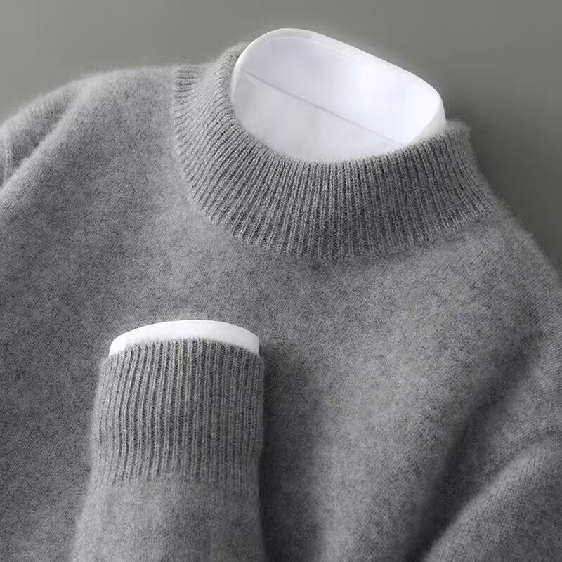 Gray brushed knit crew neck sweater with ribbed neckline and cuff