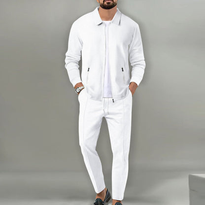 White waffle-knit zip jacket and drawstring pants set worn over a white T-shirt