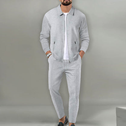 Gray waffle-knit zip jacket and drawstring pants set worn over a white T-shirt
