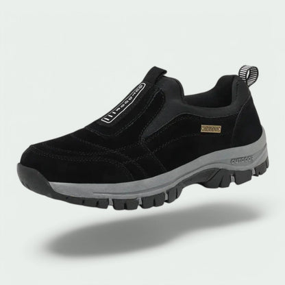 Black slip-on lug-sole walking shoe