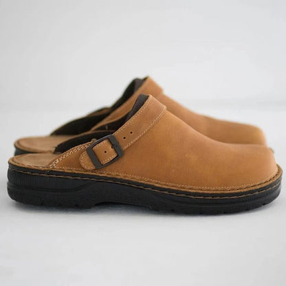 Pair of khaki buckle-strap clog slippers