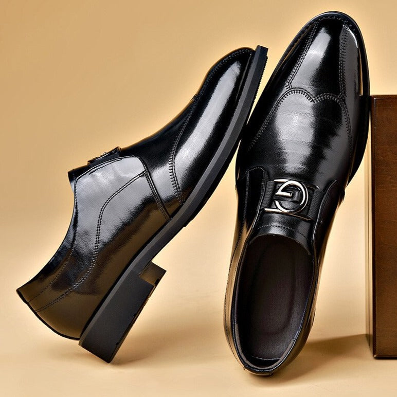 Black wingtip bit loafers with a high-shine finish