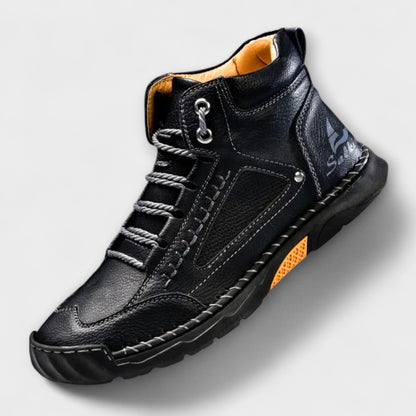 Black lug-sole stitched ankle boot