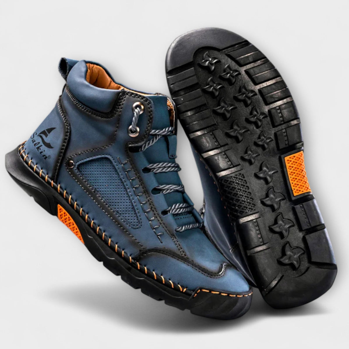 Blue lug-sole stitched ankle boots and lug sole