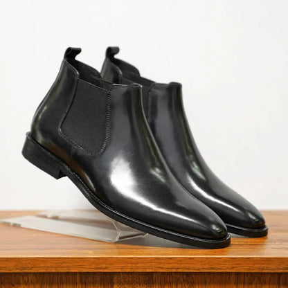 Black plain-toe Chelsea boots